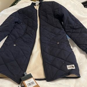New with tags blue quilted north face jacket